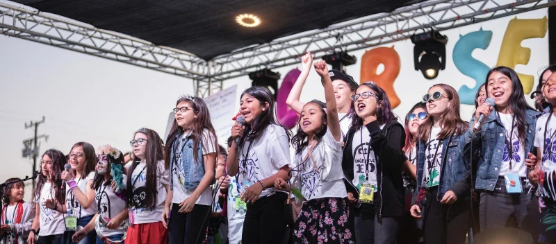 Young people performing at the annual Chicxs Rockerxs Summer Camp.