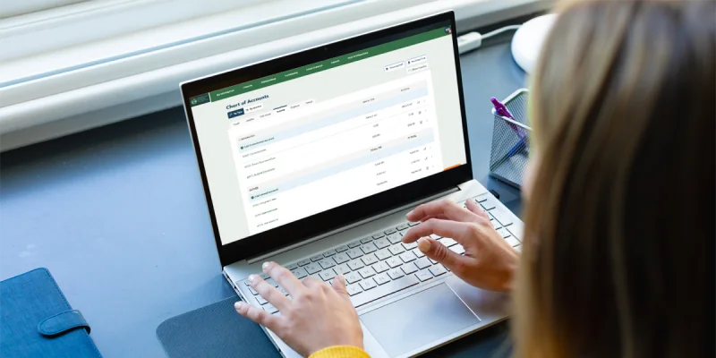 A bookkeeper reviewing their chart of accounts in MonkeyPod