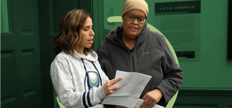 Two Humane Action Pennsylvania employees discussing their programming